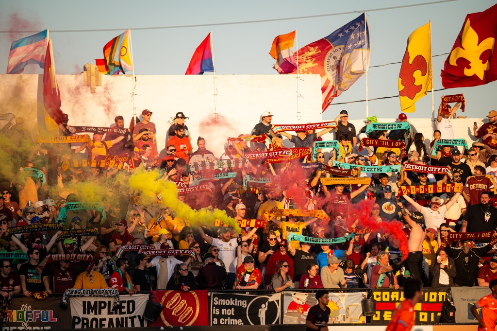 DCFC fans celebrate with flags and smoke