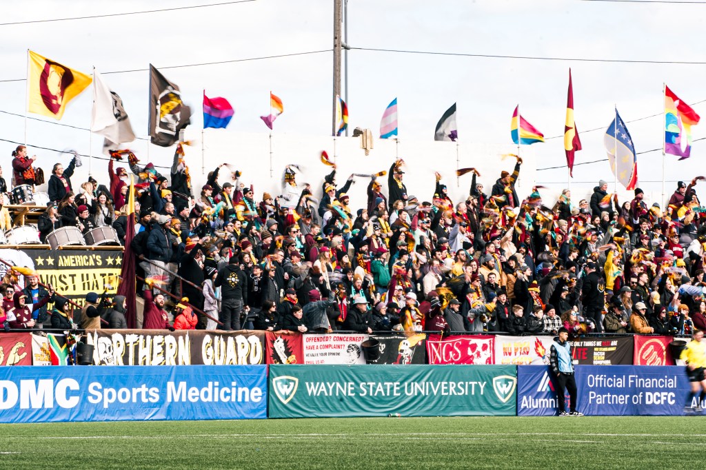 Passionate Detroit City FC fans celebrating