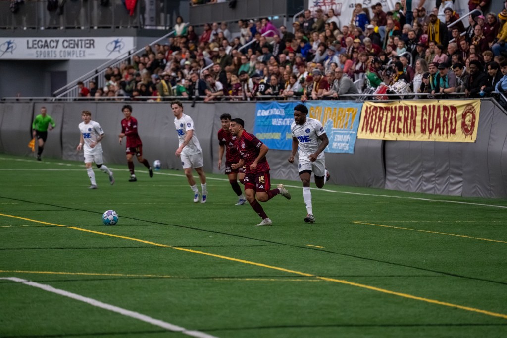 Alex Dalou controls the ball