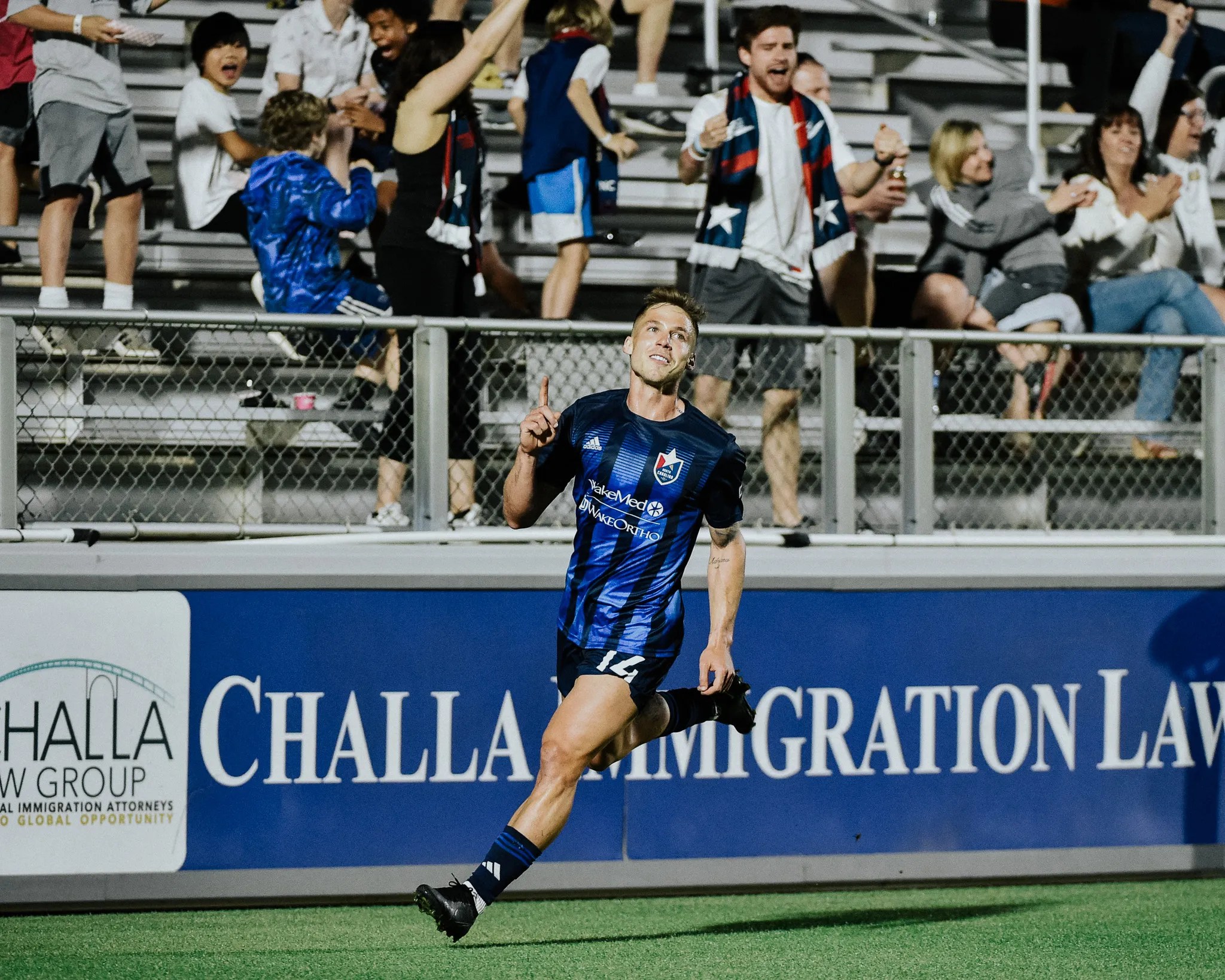 Rafa Mentzingen gestures to the home crowd after a big play