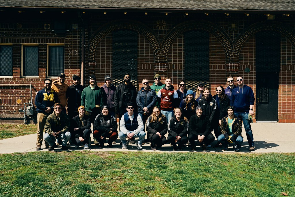 Volunteers pose for a group photo after the 2026 Legacy Partners event