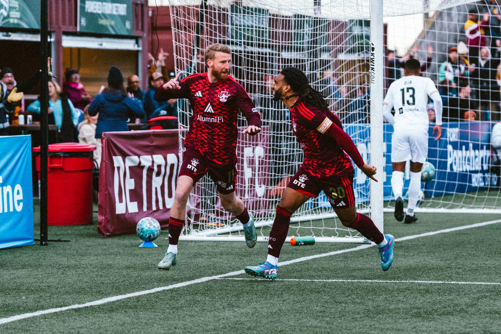 Connor Rutz celebrates his goal with Devon Amoo-Mensah
