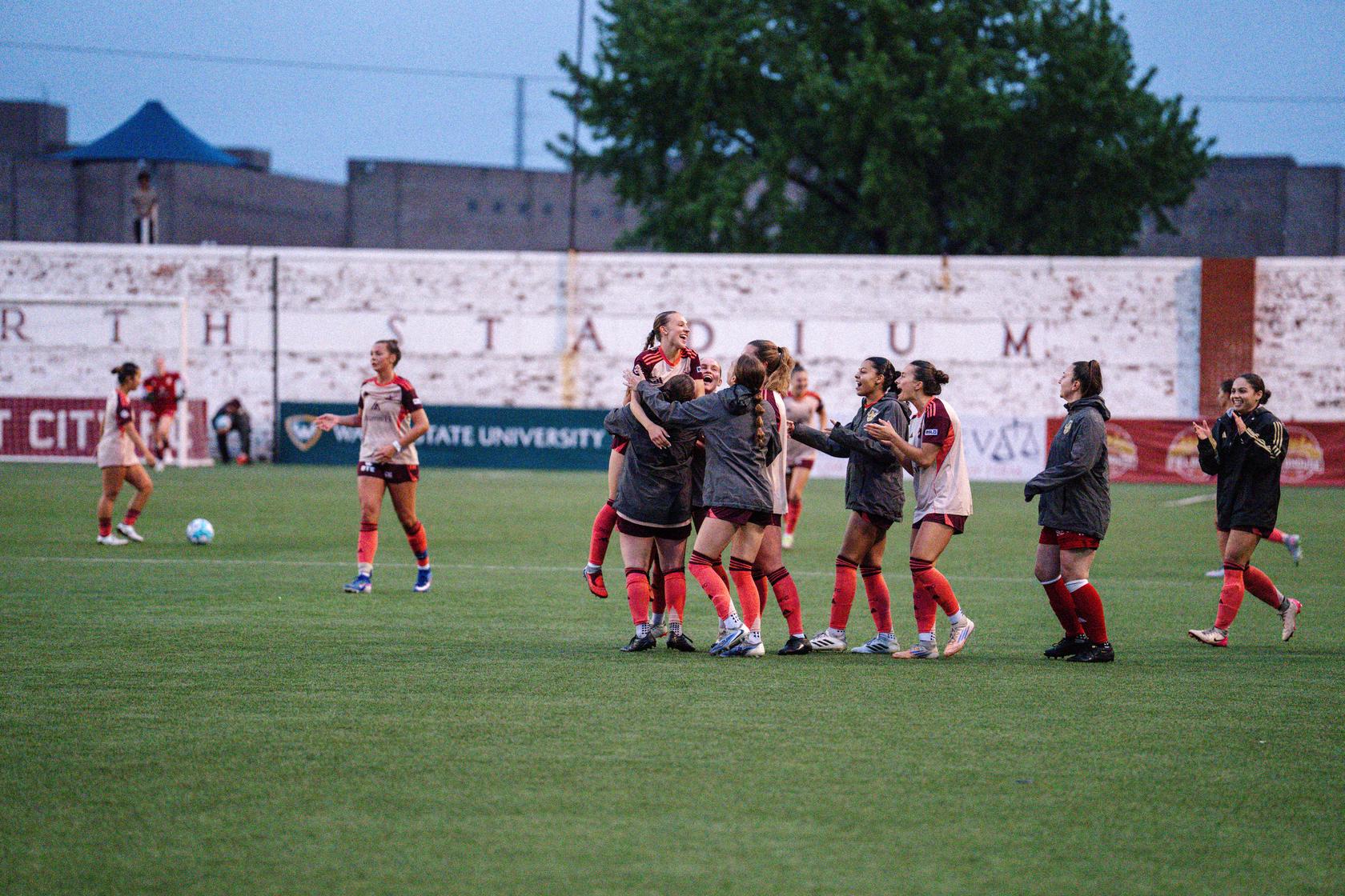DCFC celebrates as Lily Jeakle's penalty kick secures the win