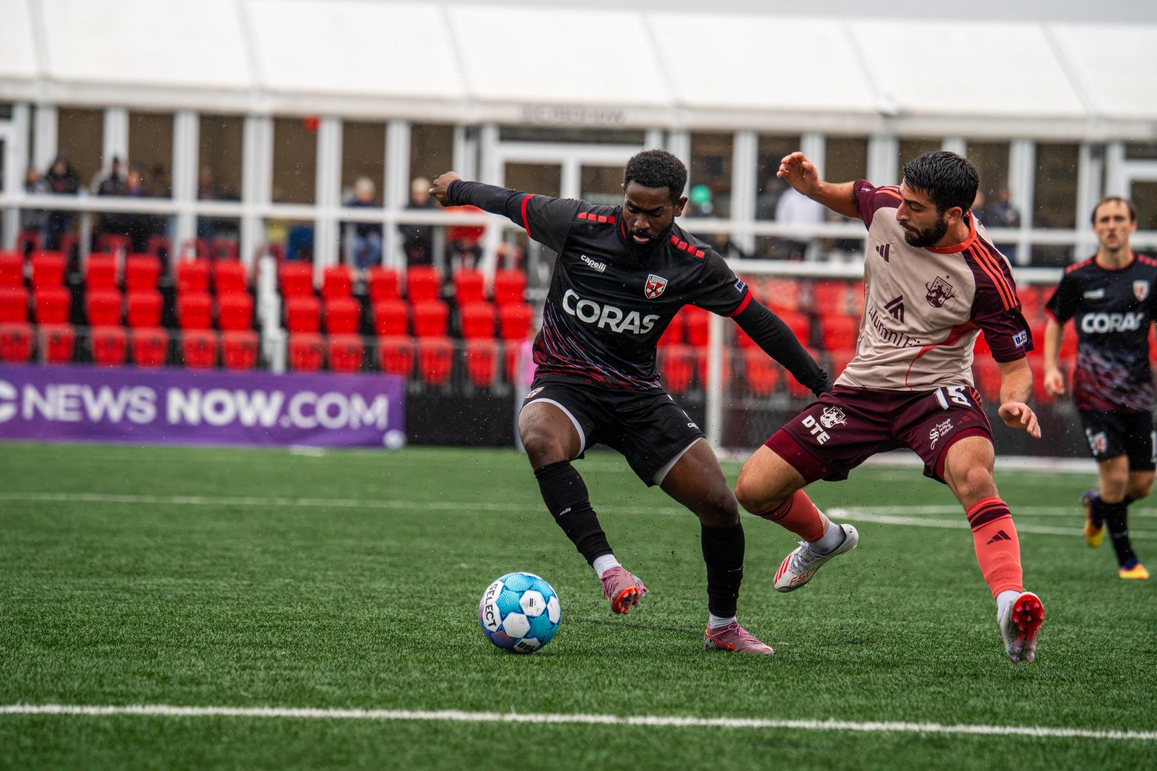 Alex Dalou battles for possession against Loudoun United